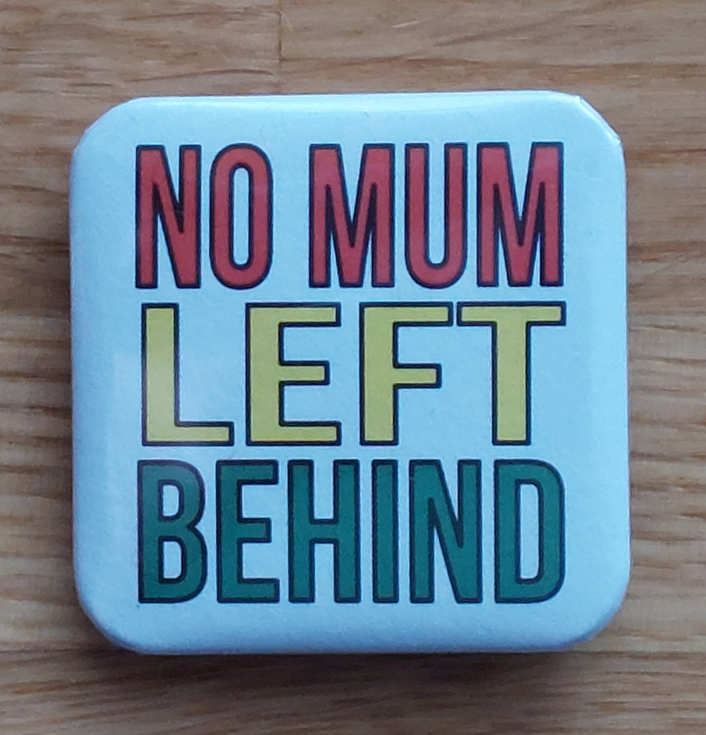 Motherland Inspired Badges & Magnets