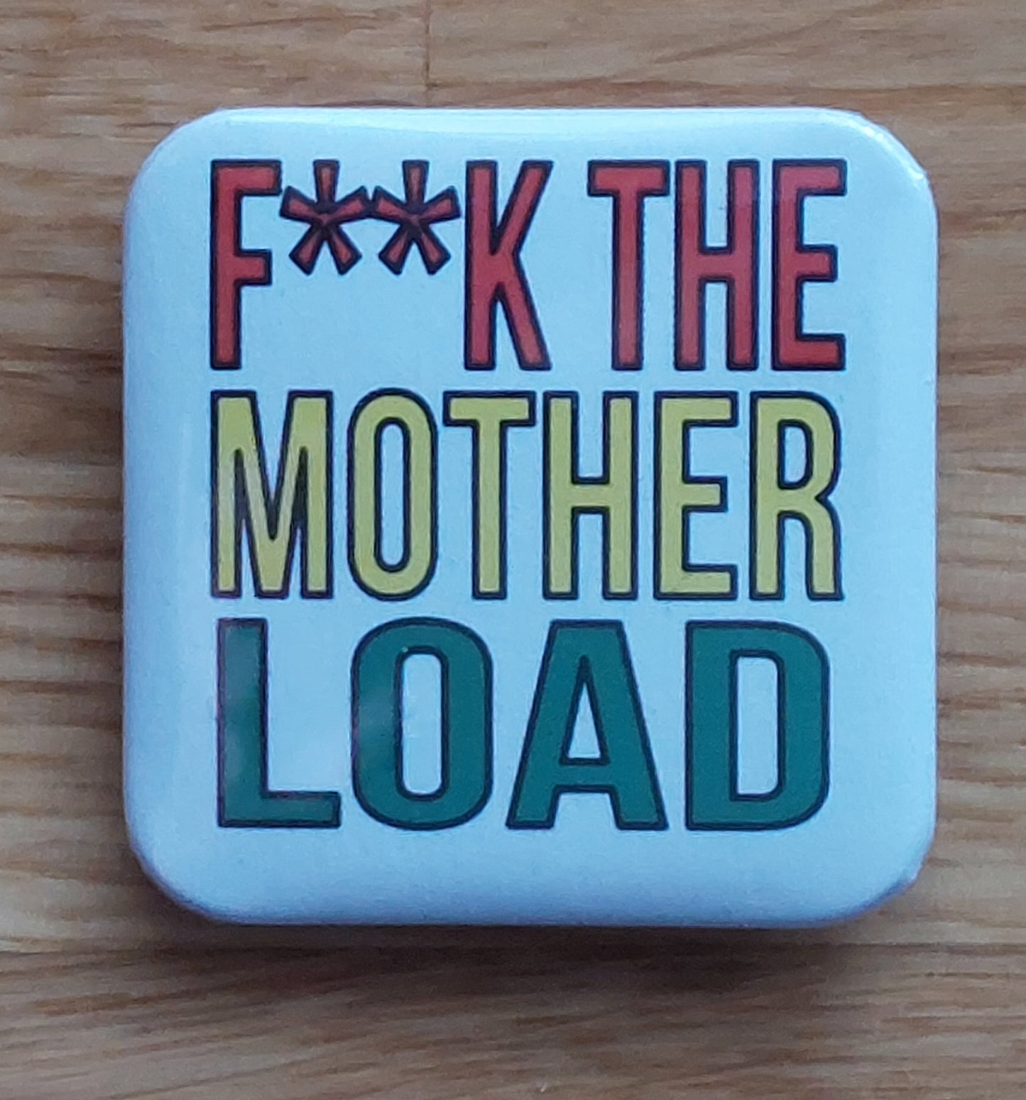 Motherland Inspired Badges & Magnets