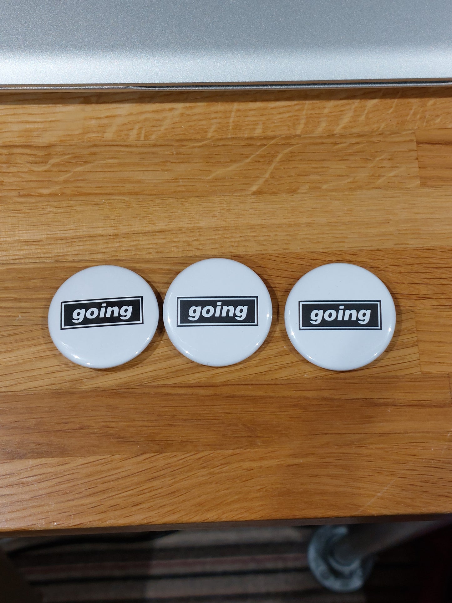 Oasis 'going' Badge